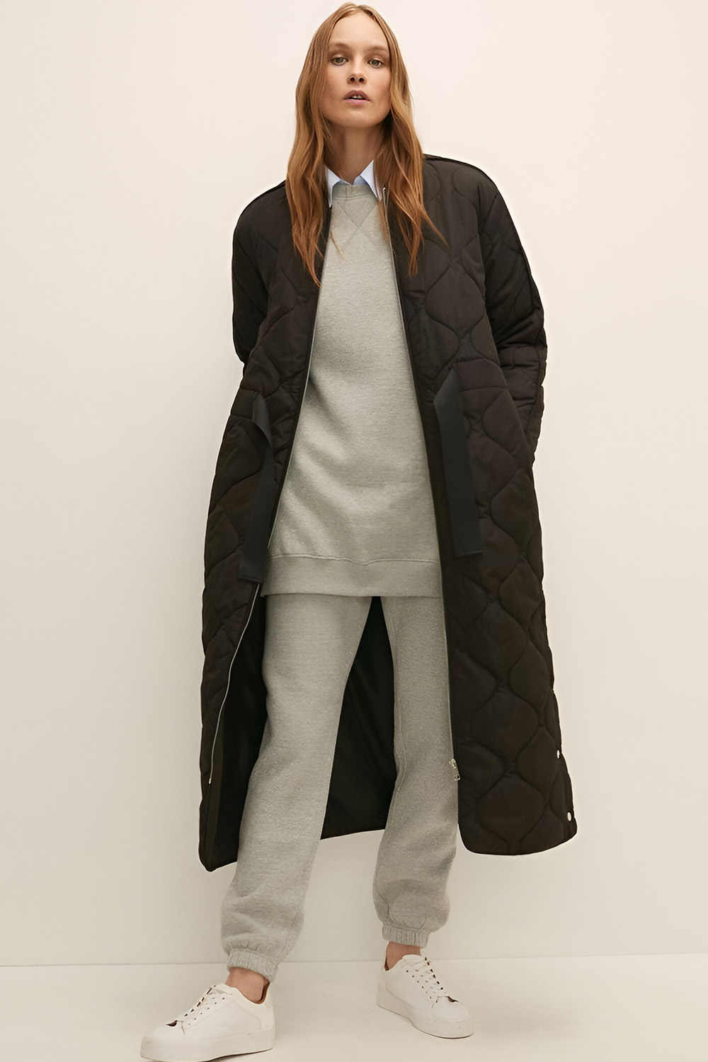 Thermal base layer paired with joggers and a statement coat
