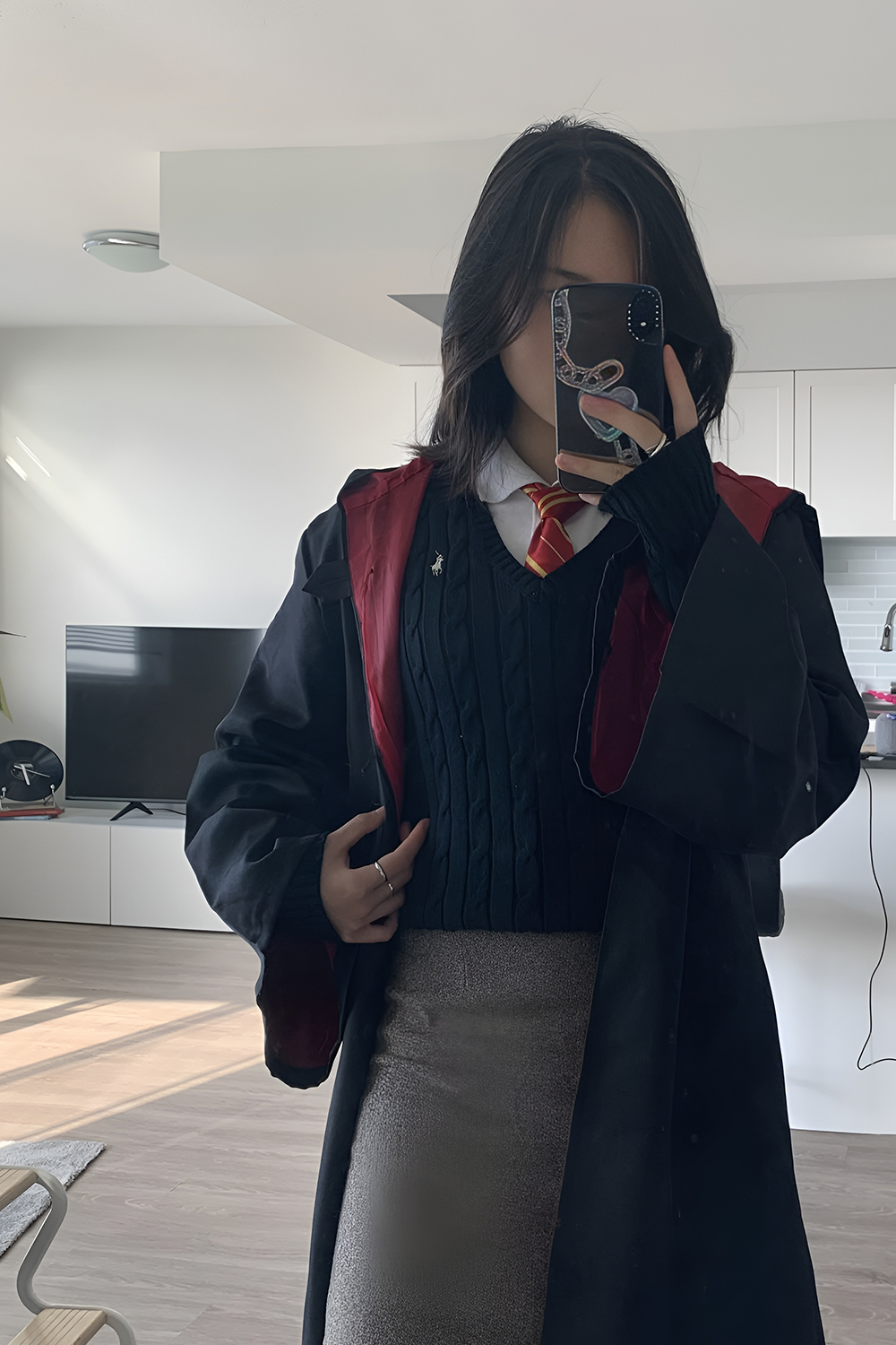 Library study session costume with cardigan, books and round glasses