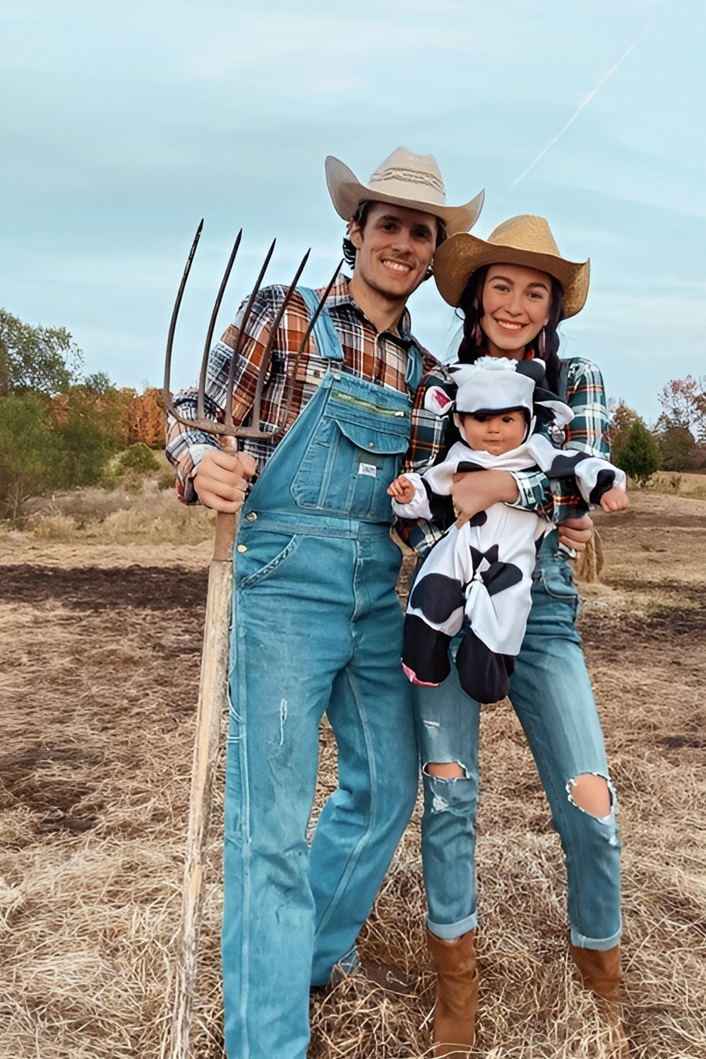 Farmer family costumes with the baby dressed as a tiny farm animal