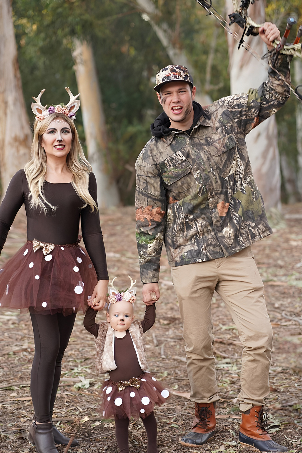 Family woodland creature costumes with a baby fawn