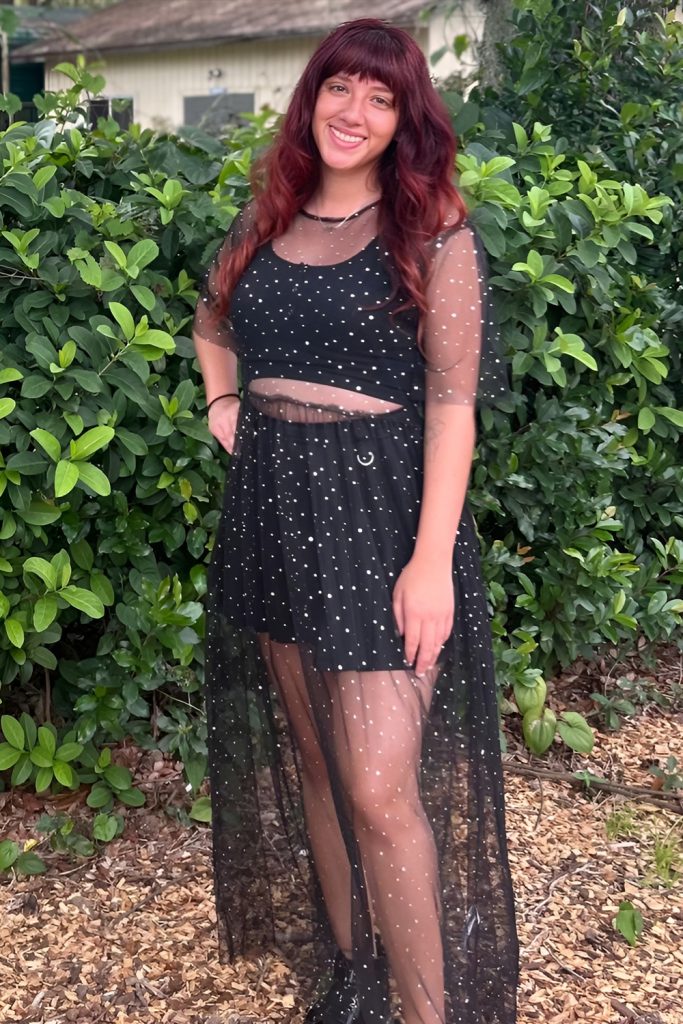 Sheer overlay dress with subtle sparkle, romantic NYE party outfit
