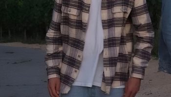 Flannel Shirt Layered Over a Neutral Tee