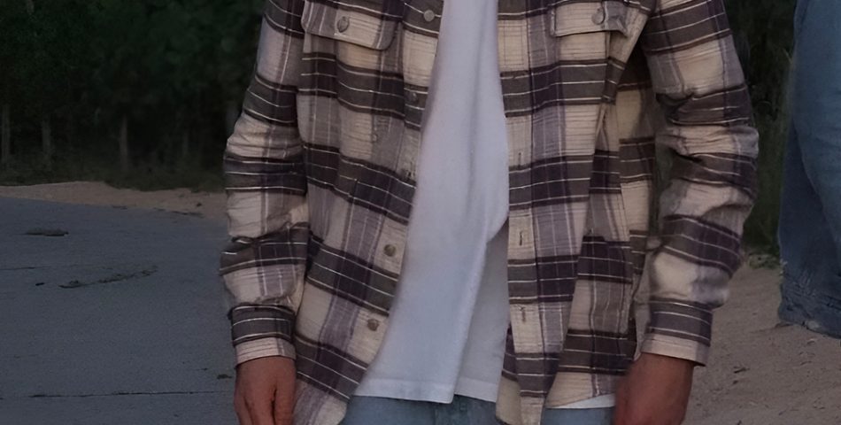 Flannel Shirt Layered Over a Neutral Tee