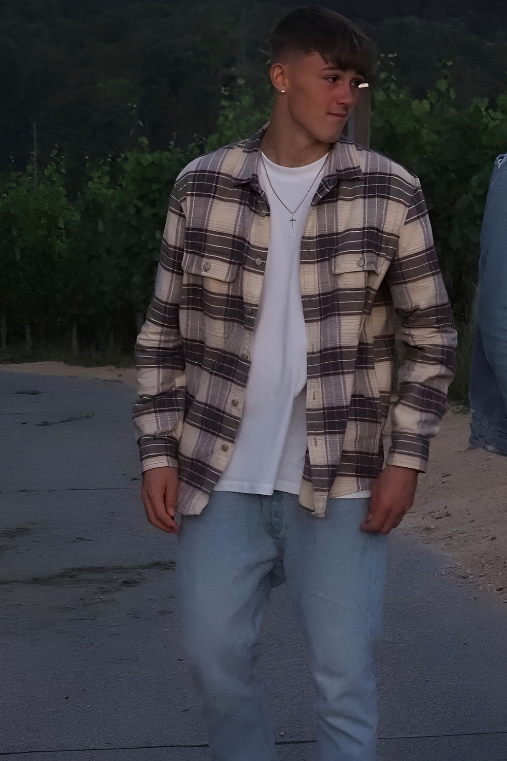 Flannel Shirt Layered Over a Neutral Tee