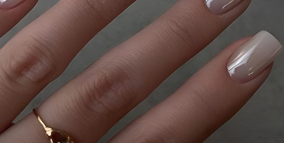 Minimalist Nude Nails with Sparkling Details