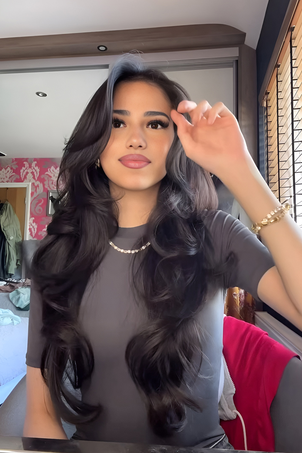 Long Layered Hair Paired with Soft Curtain Bangs