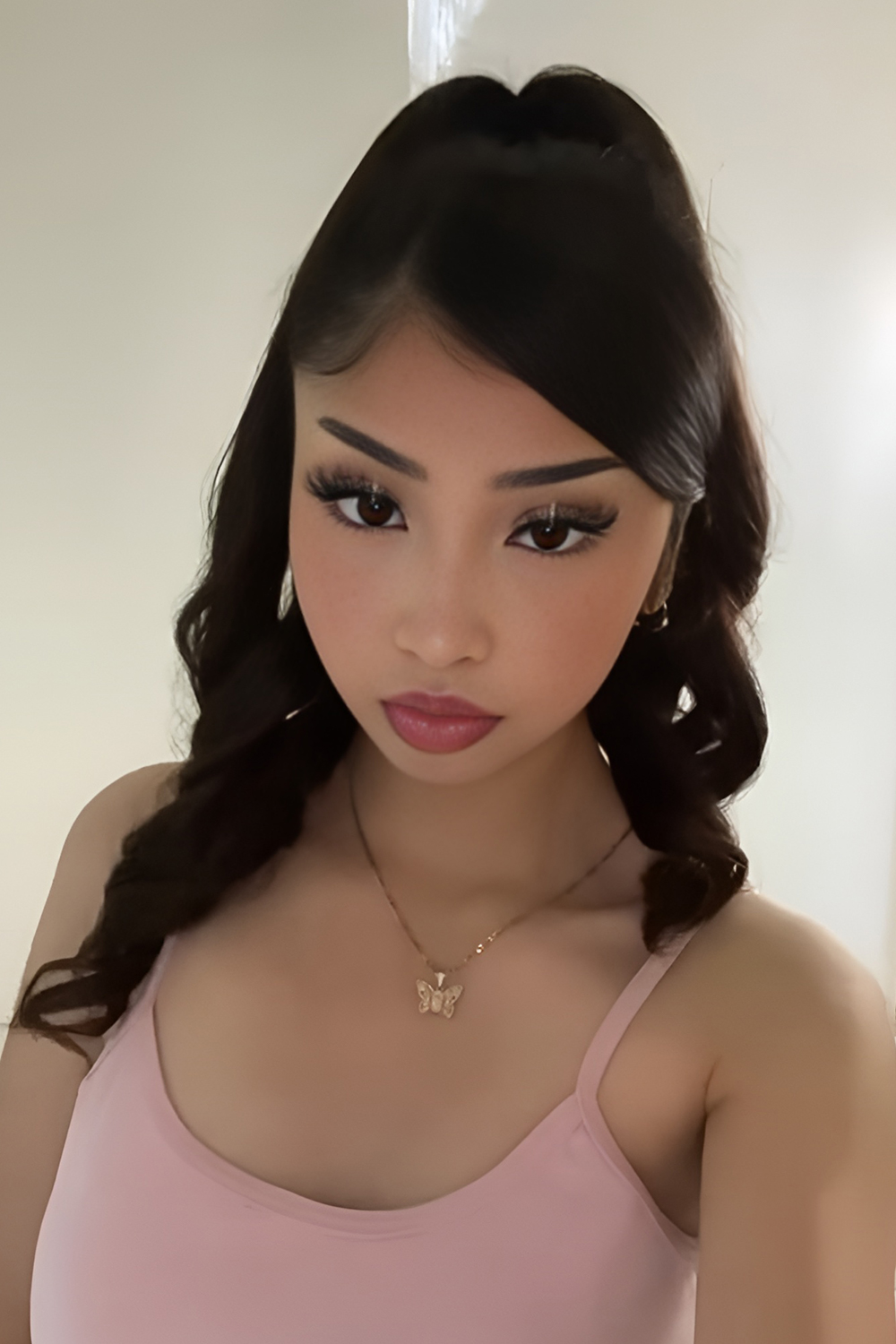 Sleek High Ponytail with Volume and Sculpted