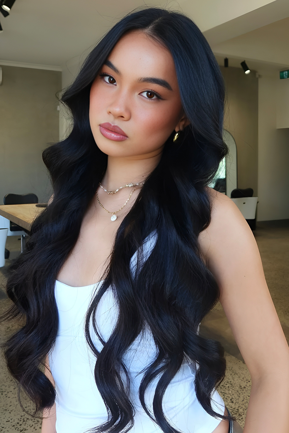 Ultra Long Jet Black Hair with a Sharp Middle Part