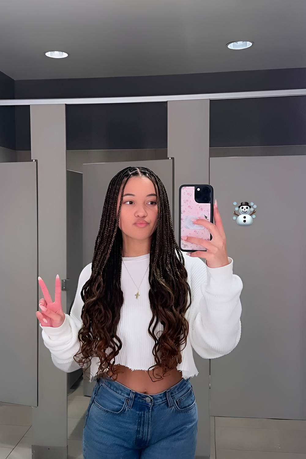 Waist Length Box Braids Styled with a Middle Part